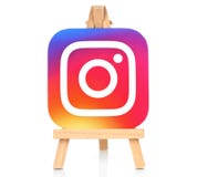 Instagram icon printed on paper and placed on wooden easel royalty free stock images Instagram icon printed on paper and placed on wooden easel royalty free stock images