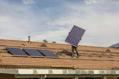 Installing new solar on residence royalty free stock photos Installing new solar on residence royalty free stock photos