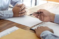 Insurance or loan real estate, Agent broker and client signing contract agreement approved to buy property had passed the stock photography Insurance or loan real estate, Agent broker and client signing contract agreement approved to buy property had passed the stock photography