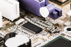 Integrated semiconductor microchip microprocessor on circuit board representative of the high tech industry and computer science Stock Image Integrated semiconductor microchip microprocessor on circuit board representative of the high tech industry and computer science Stock Image