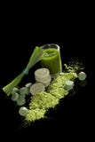 Integratore alimentare verde. immagine stock libera da diritti Integratore alimentare verde. immagine stock libera da diritti