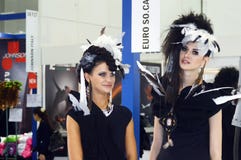 Intercharm XXI International Perfumery and Cosmetics Exhibition Two young beautiful womans in black dress stock photos Intercharm XXI International Perfumery and Cosmetics Exhibition Two young beautiful womans in black dress stock photos