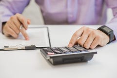 Interest Rates Documents With Calculator Stock Photo Interest Rates Documents With Calculator Stock Photo