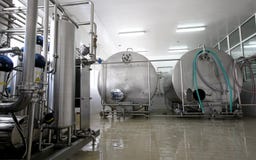 Interior de la fábrica de la leche y de la lechería fotos de archivo libres de regalías Interior de la fábrica de la leche y de la lechería fotos de archivo libres de regalías