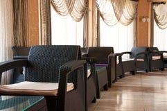 Interior in the room. Many large chairs and tables. royalty free stock photography Interior in the room. Many large chairs and tables. royalty free stock photography