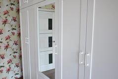 Internal details of the wardrobe. Large wardrobe. Details and close-up. royalty free stock images Internal details of the wardrobe. Large wardrobe. Details and close-up. royalty free stock images