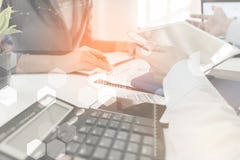 Investor executive discussing plan financial graph data on office table, finance, accounting, investment, meeting. stock photo Investor executive discussing plan financial graph data on office table, finance, accounting, investment, meeting. stock photo
