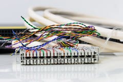 IP telephony system, Telephone cabling patch panel with twisted pairs cables for digital and analog phone connection Stock Image IP telephony system, Telephone cabling patch panel with twisted pairs cables for digital and analog phone connection Stock Image