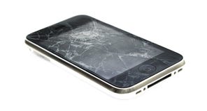 iPhone de Apple com uma tela quebrada fotos de stock iPhone de Apple com uma tela quebrada fotos de stock