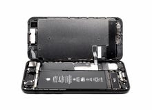 IPhone Яблока 7 демонтированных показывая компонентов внутрь стоковое изображение IPhone Яблока 7 демонтированных показывая компонентов внутрь стоковое изображение