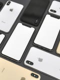 IPhonexs Gouden, Zilveren en Ruimte Grijze smartphones, mozaïeksamenstelling royalty-vrije stock afbeelding IPhonexs Gouden, Zilveren en Ruimte Grijze smartphones, mozaïeksamenstelling royalty-vrije stock afbeelding