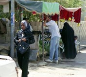 Different muslim people handles personal affairs after conflict with military during curfews royalty free stock photography Different muslim people handles personal affairs after conflict with military during curfews royalty free stock photography