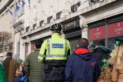 Irish Police / Garda on electric scooter on O`Connell Street in Dublin on St. Patrick`s Day stock photography Irish Police / Garda on electric scooter on O`Connell Street in Dublin on St. Patrick`s Day stock photography