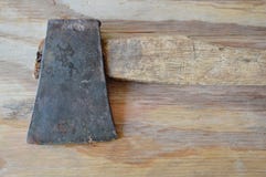 iron-ax-wooden-handle-plank-old-82922081.jpg