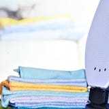 Ironing linen with iron stock images Ironing linen with iron stock images