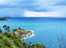 Island in the sea of ​​the rainy season There is a storm coming to the horizon. stock photo Island in the sea of ​​the rainy season There is a storm coming to the horizon. stock photo