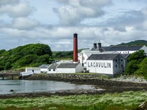 Islay, Scotland - Sseptember 11 2015: The sun shines on Lagavulin distillery warehouse stock photo Islay, Scotland - Sseptember 11 2015: The sun shines on Lagavulin distillery warehouse stock photo