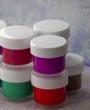 Isolated colored acrylic paints in the plastic bottles stock photo Isolated colored acrylic paints in the plastic bottles stock photo