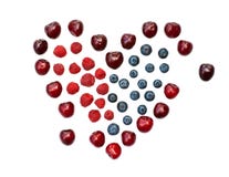 Isolated heart of cherry, blueberry and raspberry royalty free stock photography Isolated heart of cherry, blueberry and raspberry royalty free stock photography