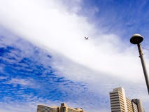 Israel, Tel Aviv - February 4, 2017 : Airplane flying in the sky above the skyscraper in Tel-Aviv stock images Israel, Tel Aviv - February 4, 2017 : Airplane flying in the sky above the skyscraper in Tel-Aviv stock images
