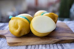 Italian cheeses collection, smoked scamorza pear shaped cheese from small cheese farm in South Italy