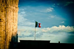 Italian Flag In Milan Sky stock photo Italian Flag In Milan Sky stock photo