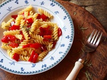 Italian pasta fusilli with red peppers stock photography Italian pasta fusilli with red peppers stock photography
