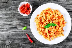 Italian Pasta Penne with Sun-Dried Tomato Pesto, top view royalty free stock images Italian Pasta Penne with Sun-Dried Tomato Pesto, top view royalty free stock images