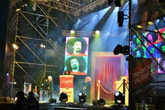 Italian popular rapper Caparezza is singing during the New Year`s concert. stock photo Italian popular rapper Caparezza is singing during the New Year`s concert. stock photo