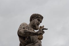 Close up view of Saint Peter the Apostle statue in front of Saint Peter`s Basilica, Piazza San Pietro, Vatican city state, Italy