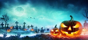 Jack O Lanterns And Zombie Hands Rising Out Of A Graveyard Royalty Free Stock Photography Jack O Lanterns And Zombie Hands Rising Out Of A Graveyard Royalty Free Stock Photography