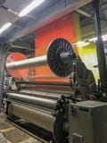 jacquard machine producing towels on a textile factory stock image jacquard machine producing towels on a textile factory stock image