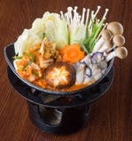 Japanese Cuisine. Hot Pot On The Background Stock Photo Japanese Cuisine. Hot Pot On The Background Stock Photo
