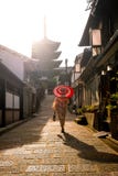 Japanese girl in Yukata with red umbrella in old town Kyoto royalty free stock photos Japanese girl in Yukata with red umbrella in old town Kyoto royalty free stock photos