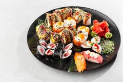 Japanese Sushi Set Set Of Fresh Tuna Maki Salmon Nigiri And Dragon Sushi Rolls Served On Black Plate Close Up Horizontal Top Stock Image Image Of Maguro Healthy