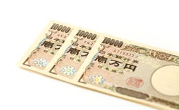 Japansk yen för sedel 10000 royaltyfri bild Japansk yen för sedel 10000 royaltyfri bild