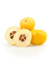 Japonica del Chaenomeles Frutas amarillas de oro japonesas del membrillo floreciente en un fondo blanco Foto de archivo Japonica del Chaenomeles Frutas amarillas de oro japonesas del membrillo floreciente en un fondo blanco Foto de archivo