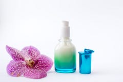 Blue Jar of cream and flower on white background, top view. Professional cosmetic products stock photo Blue Jar of cream and flower on white background, top view. Professional cosmetic products stock photo