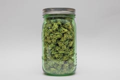 Jar of high grade medical marijuana stock photo Jar of high grade medical marijuana stock photo