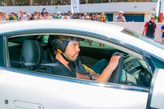 Jay Kay Jamiroquai που οδηγεί ένα Άστον Martin στη διαδρομή φυλών Kyalami στοκ φωτογραφίες με δικαίωμα ελεύθερης χρήσης Jay Kay Jamiroquai που οδηγεί ένα Άστον Martin στη διαδρομή φυλών Kyalami στοκ φωτογραφίες με δικαίωμα ελεύθερης χρήσης