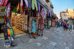 Jerusalem - 04.04.2017: Tourists walk trough the market in the o royalty free stock image Jerusalem - 04.04.2017: Tourists walk trough the market in the o royalty free stock image