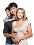 Jeune famille heureux avec le joli enfant image stock Jeune famille heureux avec le joli enfant image stock