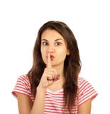 Jeune fille effectuant le geste de silence fille émotive d'isolement sur le fond blanc photos libres de droits Jeune fille effectuant le geste de silence fille émotive d'isolement sur le fond blanc photos libres de droits