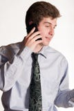 Jeune homme d'affaires au téléphone portable photos stock Jeune homme d'affaires au téléphone portable photos stock