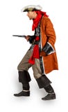 Jeune homme dans un costume de pirate avec le pistolet image stock Jeune homme dans un costume de pirate avec le pistolet image stock