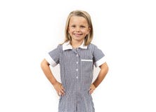 Jeunes belles et heureuses années de cheveux blonds de la fille d'enfant 6 à 8 et uniforme scolaire de port excité de sourire d'y photos libres de droits Jeunes belles et heureuses années de cheveux blonds de la fille d'enfant 6 à 8 et uniforme scolaire de port excité de sourire d'y photos libres de droits