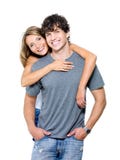 Jeunes couples heureux regardant l'appareil-photo images stock Jeunes couples heureux regardant l'appareil-photo images stock