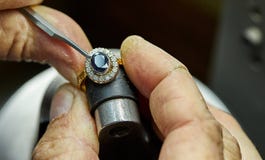 Jewelry production. The process of fixing stones stock photography Jewelry production. The process of fixing stones stock photography