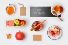 Jewish holiday Rosh Hashana mock up template with honey jar,apples and pomegranate. View from above. stock photography Jewish holiday Rosh Hashana mock up template with honey jar,apples and pomegranate. View from above. stock photography