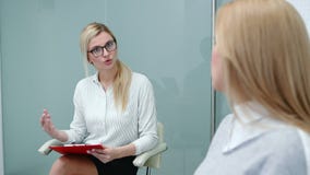 Job interview with hr specialist in big company for applicant woman. stock video footage Job interview with hr specialist in big company for applicant woman. stock video footage